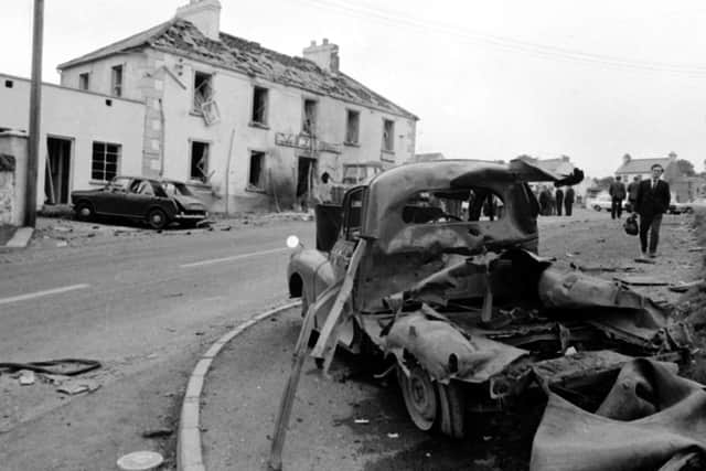 The scene outside the Beavpont Arms, in the Co Londonderry village of Claudy on July 31, 1972, after three car bombs exploded killing nine people, including mother-of-eight Rose McLaughlin