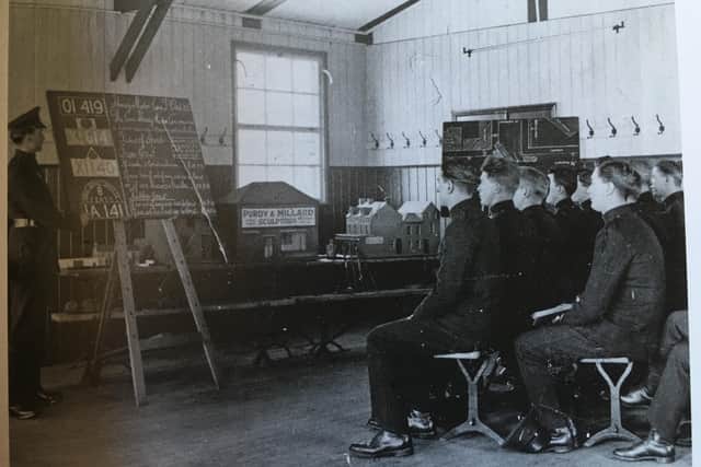 An instruction class on 'vehicle registration' at Newtownards Camp in the late 1920s or early 1930s. Photo courtesy of the Police Museum in Belfast
