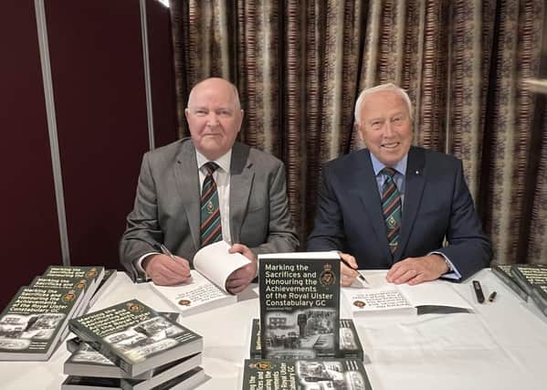 Authors Roy Black (left) and Professor Stephen White at the launch of 'Marking the Sacrifices and Honouring the Achievements of the Royal Ulster Constabulary GC’ at Newforge