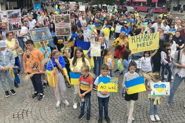 Members of the Ukraine community in Northern Ireland and supporters take part in a march in Belfast calling for solidarity and support of Ukraine in the ongoing Russian invasion