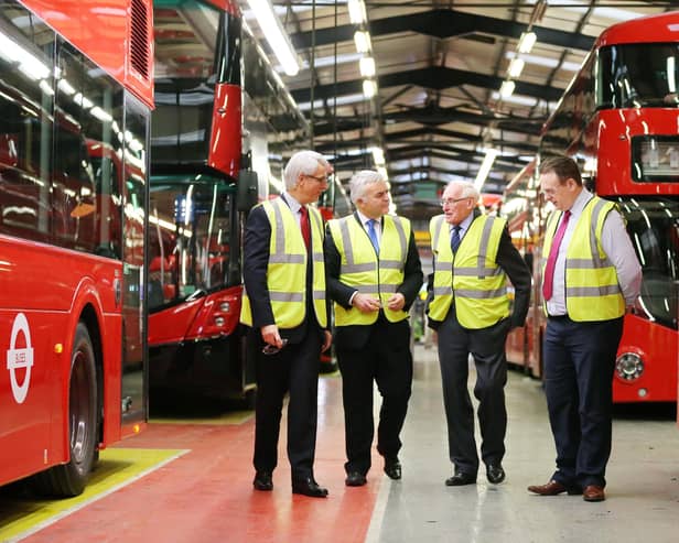 Trade and Investment Minister Jonathan Bell is pictured at Ballymena bus builder Wrightbus in 2015 with Mark Nodder (Wrightbus), William Wright (Wrightbus) and Steven Francey (Wrightbus).

Picture by Kelvin Boyes / Press Eye