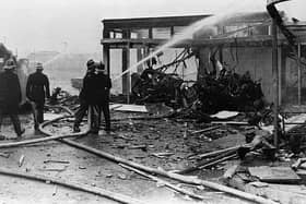 Firefighters at Oxford St bus station on Bloody Friday, when the IRA bombed Belfast