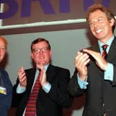 Northern Ireland Secretary Mo Mowlam, Northern Ireland First Minister David Trimble and British Prime Minister Tony Blair on the platform during the Labour Party conference in Blackpool