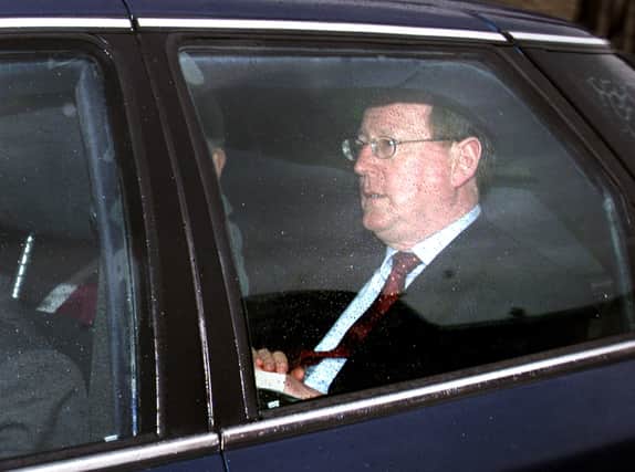 David Trimble arrives at Hilsborough Castle for crisis talks on the future of Northern Ireland July 4, 2002