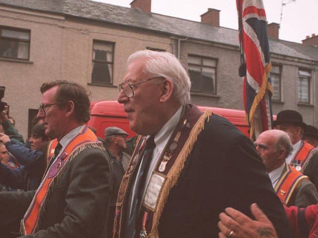 David Trimble (left) and Rev Ian Paisley join the Orange Drumcree parade at the end of the Garvaghy Road in July 1995. Photo: Pacemaker Belfast