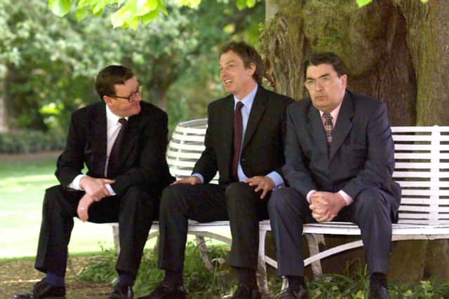 File photo dated 21/5/1998 of Prime Minister Tony Blair (centre) with (left) David Trimble and (right) John Hume on the last day of campaigning for a Yes vote in the Northern Ireland Referendum. Photo credit: Chris Bacon/PA Wire