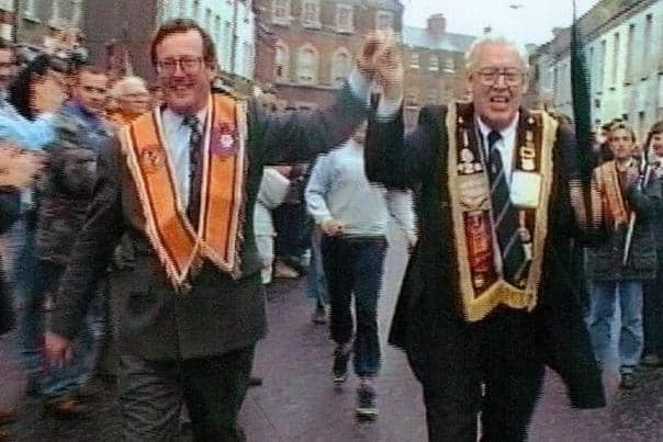 David Trimble (left) and Rev Ian Paisley outside Carleton Street Orange Hall after the banned parade was eventually allowed to proceed along the Garvaghy Road in July 1995. Photo: Kelvin Boyes/PressEye