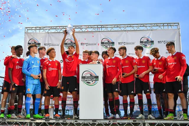 Manchester United celebrate their SuperCupNI Elite Challenge victory over Northern Ireland