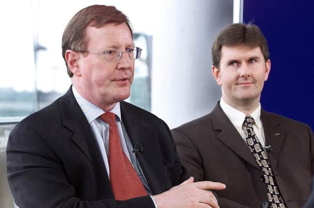 The then Ulster Unionist leader David Trimble with the then UUP MP Jeffrey Donaldson in  2000, after Trimble won the backing of his 800 strong Unionist Council  to go into power sharing with Sinn Fein (Photo: PAUL FAITH/AFP via Getty Images)