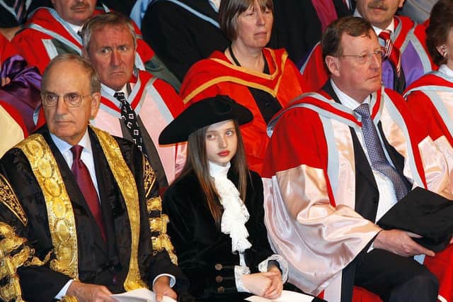 A decade after the Belfast Agreement, Senator George Mitchell, left, and David Trimble, right, at Queen's University in Belfast for conferment of honorary degrees on Tony Blair and Bertie Ahern. Picture: Diane Magill