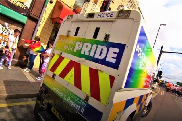 A PSNI LGBTQ+-liveried vehicle at 2018 pride in Belfast