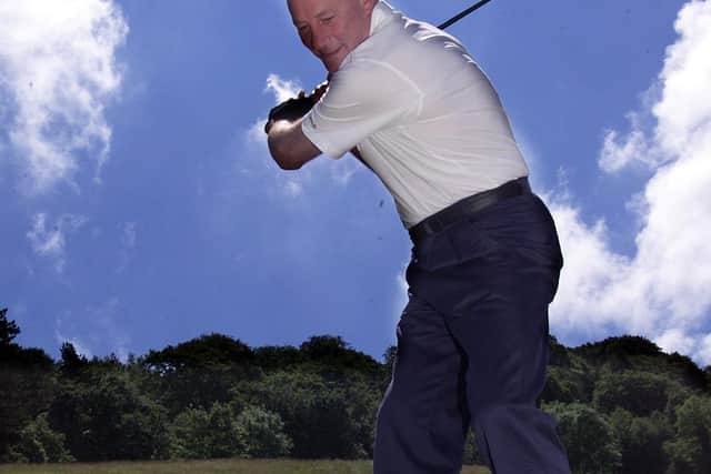 Terry Neill tees off at Holywood Golf Club for the MS Society golf day in 2002