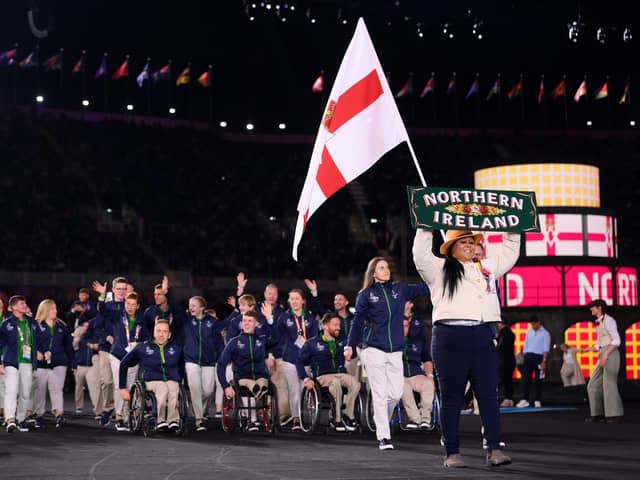 Martin McHugh and Michaela Walsh, Flag Bearers of Team Northern Ireland, lead their team out during the Opening Ceremony of the Birmingham 2022 Commonwealth Games at Alexander Stadium last night.