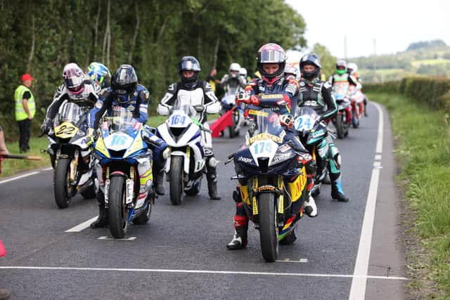 Davey Todd (174), Mike Browne (16) and Paul Jordan (22) on the grid before the first Supersport qualifying session at the Armoy Road Races on Friday.