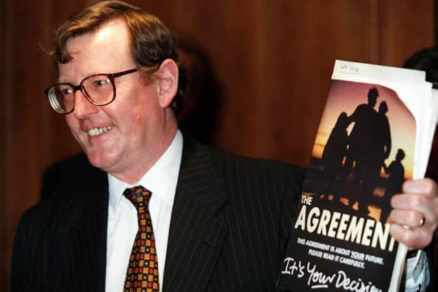 Ulster Unionist Party leader David Trimble pictured with his copy of the Agreement at a press conference in the Europa Hotel.