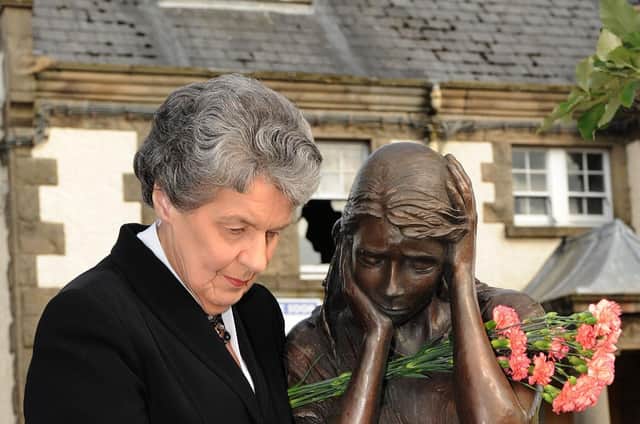 Claudy bomb anniversary. Picture by Gavan Caldwell
.
Mary Hamilton remembering the bomb victims
at the Claudy memorial.