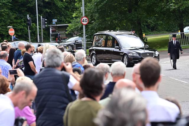 The hearse carrying Lord Trimble’s coffin approaches Harmony Hill Presbyterian Church
