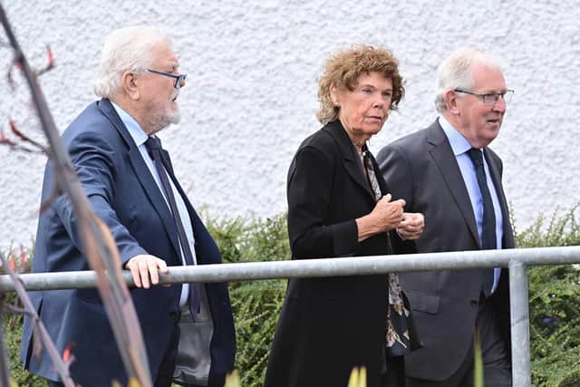 Lord  Maginnis (left) and Dame Kate Hoey arrive for the funeral service