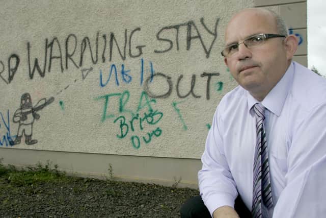 Cllr John Finlay at Dunloy Orange which has been daubed with Slogans relating to him and threats to get out of the village this comes on the back of the Ballymaconnolly parade in Rasharkin only a few miles away.Picture Steven McAuley/Kevin McAuley Photography Multimedia