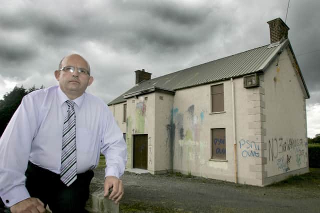 Cllr John Finlay at Dunloy Orange which has been daubed with Slogans relating to him and threats to get out of the village this comes on the back of the Ballymaconnolly parade in Rasharkin only a few miles away.Picture Steven McAuley/Kevin McAuley Photography Multimedia