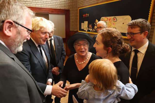UUP leader Doug Beattie, Prime Minister Boris Johnson, Lady Daphne Trimble Nicholas, and Sarah Trimble, after the funeral of former Northern Ireland first minister and UUP leader David Trimble, who died last week aged 77, at Harmony Hill Presbyterian Church, Lisburn.