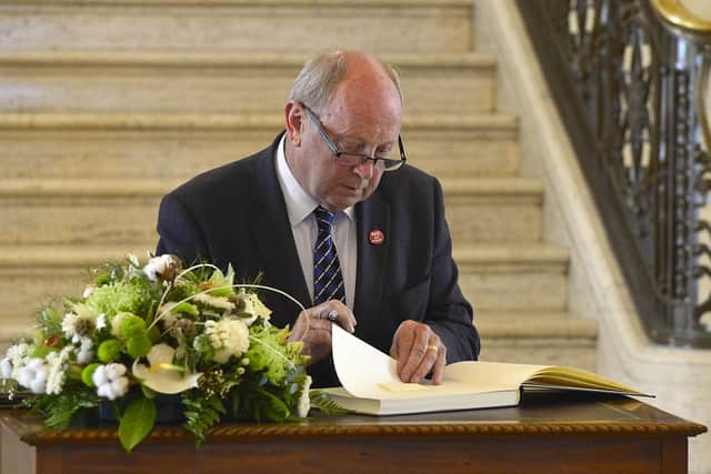 Jim Allister  signs the Book of Condolence at the Great Hall, Stormont, Northern Ireland on Tuesday