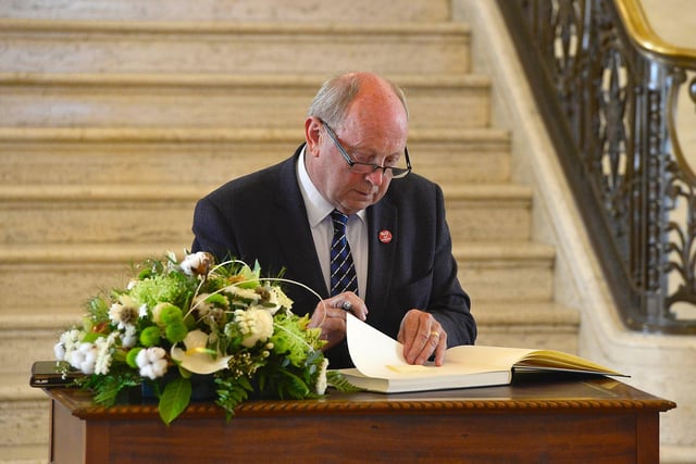 Signing the book of Condolences at Stormont