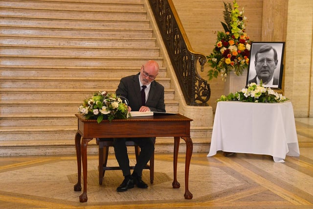 Signing the book of Condolences at Stormont