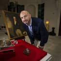 Dr Christopher Warleigh-Lack, National Trust property curator looks at an inkstand and inkwells belonging to Viscount Castlereagh which are on display at his former home, Mount Stewart in Newtownards, which opens an exhibition on his life and legacy, in the 200th year since his death.