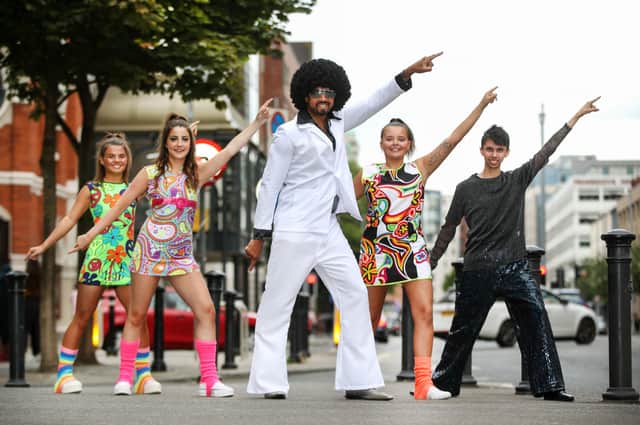 ‘JJ Jackson’ AKA Q Radio’s Ibe Sesay is joined by dancers Caitlin Shaw and Lucy Burns as Northern Ireland’s most iconic disco from the 90’s, the Groovy Train, gets ready to roll back into Belfast on the bank holiday weekend, Sunday August 28 at the Europa Hotel