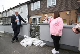 Minister John O'Dowd is addressing flooding concerns in Strabane.