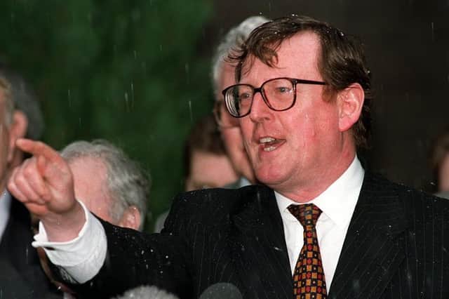 Ulster Unionist party leader David Trimble and his talks team emerge from Castle Buildings to give their take on the signing of the Good Friday Agreement