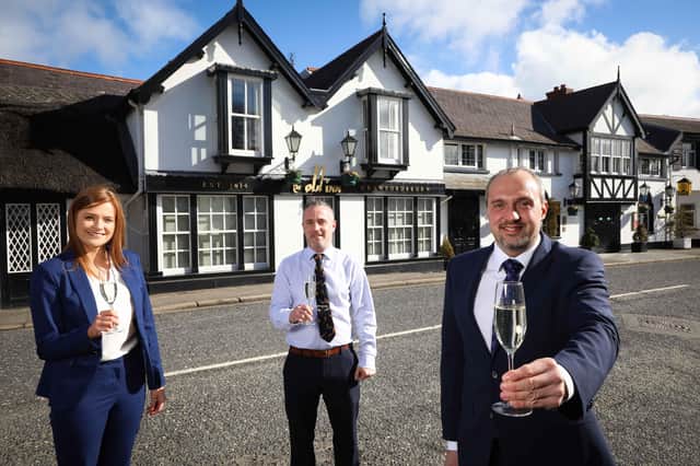 Pictured celebrating the announcement are The Old Inn project team Charlotte McClean, Andy Johnston and Colin Johnston