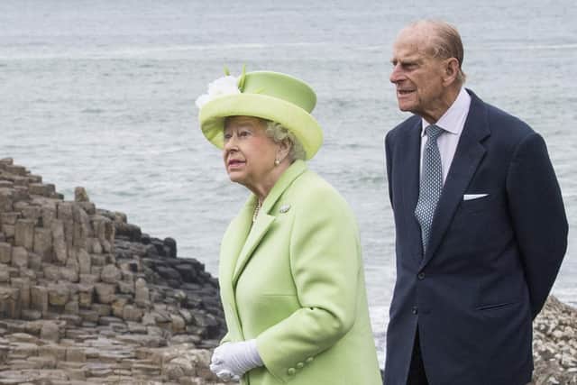 GIANTS CAUSEWAY, NORTHERN IRELAND - JUNE 28: Queen Elizabeth II and Prince Philip, Duke Of Edinburgh visit the Giants Causeway on June 28, 2016