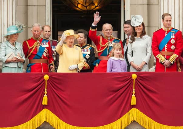 The Queen and Prince Philip wave to crowds from Buckingham Palace in 2012. Archbishop Martin writes: "Her Majesty the Queen, and all the members of the Royal family, are in our prayers on the death of a much loved husband, father, grandfather and great grandfather"