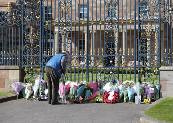 Members of the public have left florals tributes to the Duke of Edinburgh at Hillsborough Castle. 

Photo: Philip Magowan / Press Eye