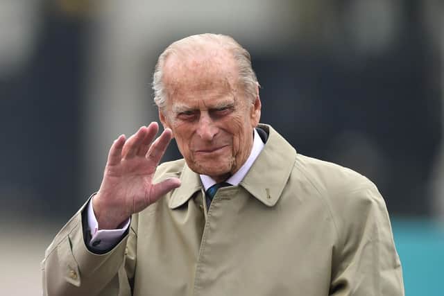 Duke of Edinburgh standing in an open topped Range Rover as part of the Queen's 90th birthday celebrations in The Mall, London in 2016. Photo: Dominic Lipinski/PA Wire