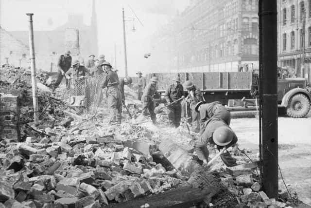 Soldiers searching rubble during the Belfast Blitz