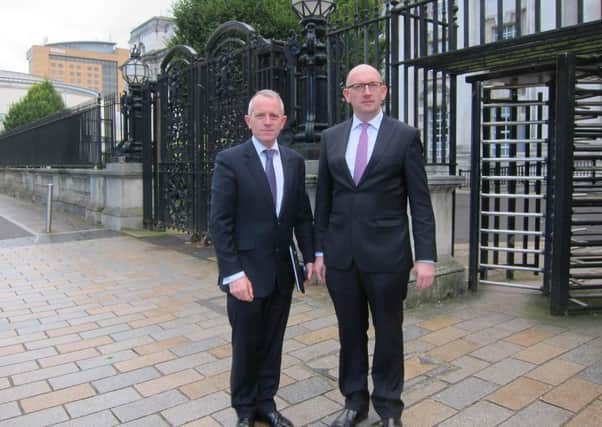 Andrew Trimble, left, chairman  of the Renewable Heat Association Northern Ireland (RHANI), with Tom Forgrave, director of outside the High Court in Belfast in 2017 for their judicial review case on changes to RHI