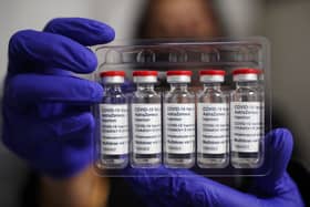 Vials of the Oxford/AstraZeneca coronavirus vaccine. Ireland’s advisory body has recommended restrictions of its use after the European Medicines Agency warned that it is associated with rare blood clots. Photo: Yui Mok/PA Wire