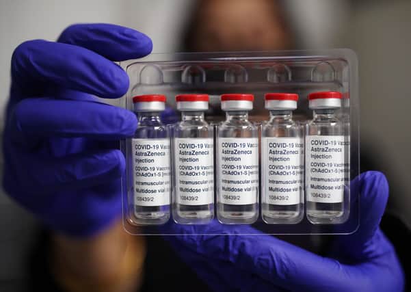 Vials of the Oxford/AstraZeneca coronavirus vaccine. Ireland’s advisory body has recommended restrictions of its use after the European Medicines Agency warned that it is associated with rare blood clots. Photo: Yui Mok/PA Wire