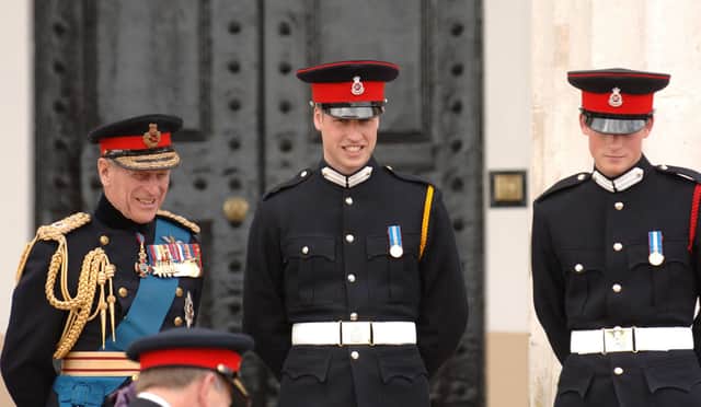 Princes William and Harry with their grandfather, the Duke of Edinburgh