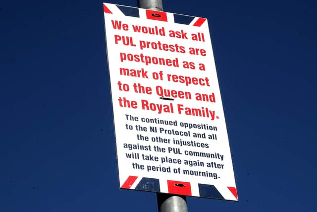 PUL (Protestant, Unionist Loyalist) posters calling for postponement of protests as a mark of respect to the Royal Family following the death of the Duke Of Edinburgh.