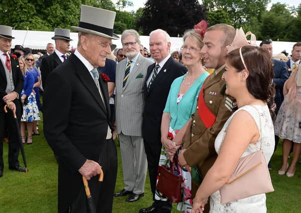 The Duke of Edinburgh speaking to guests at a garden party at Buckingham Palace in London on June 1, 2017. 
The event was also attended by Stanley and Helen Wilson. Photo: John Stillwell/PA Wire