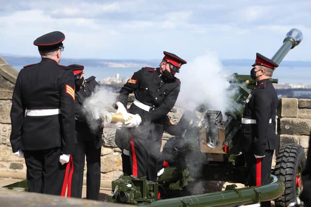 Members of the 105th Regiment Royal Artillery fire a 41-round gun salute at Edinburgh Castle, to mark the death of the Duke of Edinburgh. Picture date: Saturday April 10, 2021. PA Photo. Prince Philip, 99, was the longest-serving consort in British history. See PA story DEATH Philip. Photo credit should read: Andrew Milligan/PA Wire