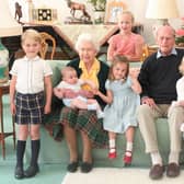 Handout image taken at Balmoral in 2018 and released on 14/04/21 of Queen Elizabeth II and the Duke of Edinburgh with their great grandchildren. Pictured (left to right) Prince George, Prince Louis being held by Queen Elizabeth II, Savannah Phillips (standing at rear), Princess Charlotte, the Duke of Edinburgh, Isla Phillips holding Lena Tindall, and Mia Tindall. Issue date: Wednesday April 14, 2021.