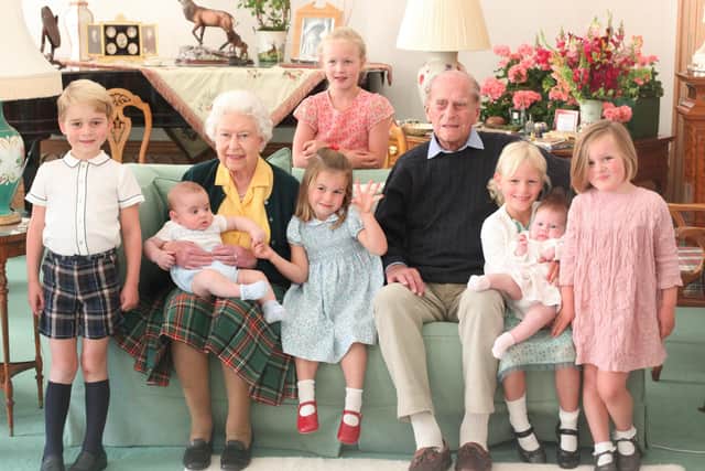 Handout image taken at Balmoral in 2018 and released on 14/04/21 of Queen Elizabeth II and the Duke of Edinburgh with their great grandchildren. Pictured (left to right) Prince George, Prince Louis being held by Queen Elizabeth II, Savannah Phillips (standing at rear), Princess Charlotte, the Duke of Edinburgh, Isla Phillips holding Lena Tindall, and Mia Tindall. Issue date: Wednesday April 14, 2021.