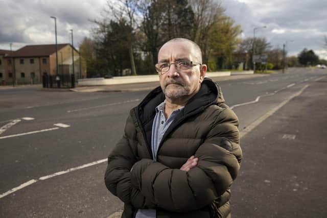 Community worker Issac Andrews stands on the Springfield Road in west Belfast where last week he witnessed violence of a ferocity that he hadn't seen since the early days of the Troubles in 1970s. Pic: Liam McBurney/PA Wire