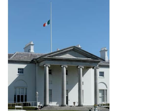 The tricolour flying at half mast at Áras an Uachtaráin to mark the funeral of Prince Philip on Saturday. Taken from President of Ireland Twiter @PresidentIRL with the message "The tricolour flying at half mast at Áras an Uachtaráin today, to mark the death of Britain's Prince Philip" April 17 2021
