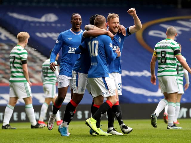 Rangers' Steven Davis (centre) celebrates scoring the first goal of the game against Celtic at Ibrox.